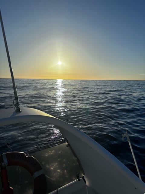 Sunset yacht tour with food and wine tasting. - Exploring Madalenas Islets and Porto Pim Bay