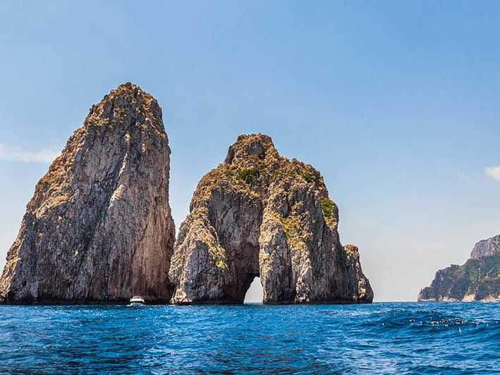 Unraveling Capri: A Journey from Napoli - Approaching Capri: Impressive Cliffs and Lush Greenery